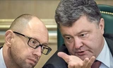 Tổng thống Poroshenko (phải) kêu gọi Thủ tướng Yatsenyuk (trái) từ chức. Ảnh: Kommersant