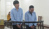 Hai bị cáo trong phiên xử. Ảnh: BH