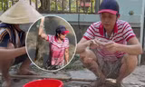 Hoài Linh lấm lem bùn đất, tự tay ra ao thả lưới bắt cá