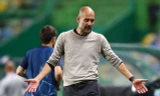 HLV Pep Guardiola thất vọng khi Man City bị loại khỏi Champions League.
