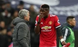 HLV Jose Mourinho và tiền vệ Paul Pogba.