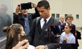 Ronaldo ký tặng fan nữ cuồng nhiệt.