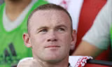 Wayne Rooney trên đường trở lại nước Anh.