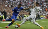 Cố nhân Morata (trái) gieo sầu cho Real.