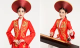 Mỹ Linh mặc áo dài, đánh đàn bầu tại phần thi tài năng ở Miss World
