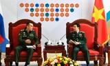Bộ trưởng Quốc phòng Việt Nam (bên phải) và Thứ trưởng Quốc phòng Nga tại cuộc gặp, sáng 4/9. Ảnh: Tuấn Huy