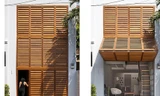 Nhà ống ấn tượng với tấm cửa khổng lồ che nắng và lưu thông gió