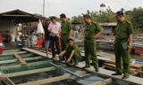 Cục cảnh sát Môi trường phối hợp với Phòng cảnh sát Môi trường, Công an tỉnh Đồng Nai khảo sát tại làng cá bè trên sông Cái