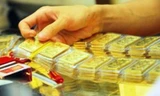 Vàng và USD cùng kết thúc đợt giảm