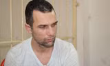 Đối tượng Ivan Slavov Rusev bị bắt tại TP HCM. Ảnh: Phùng Bắc