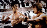 Lý Tiểu Long và Chuck Norris. Ảnh: Sina.