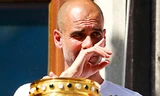 Guardiola không giấu ngậm ngùi khi nói về thất bại ở Champions League. Ảnh: Reuters.