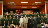 Trung tướng Đồng Sỹ Nguyên (hàng đầu, ở giữa) với các đại biểu trong buổi gặp mặt nhân dịp kỷ niệm 58 năm Ngày truyền thống Bộ đội Trường Sơn (19-5-1959 / 19-5-2017). Ảnh: TRƯỜNG SƠN