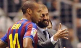 Henry từng giành cú ăn sáu năm 2009 với Pep và Barca. Ảnh: Reuters