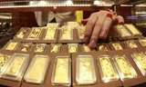 Giá vàng dự báo sẽ lập đỉnh cao mới (phá đỉnh cũ 1.920 USD/Ounce hồi 9/2011) chỉ trong 18 tháng tới. Ảnh minh họa
