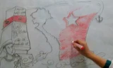 Hình ảnh Trường Sa được các em thể hiện bằng hình vẽ trên bảng mica. Ảnh cắt từ clip.