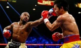 Mayweather trong trận thắng đầy tranh cãi với Pacquiao. Ảnh: Daily Mail.