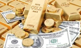 Giá vàng đang chịu áp lực giảm từ đồng USD mạnh. 