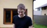 “Người thổi còi” Edward Snowden (Ảnh: Sputnik News)