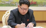 Lãnh đạo Triều Tiên ký quyết định lần đầu tiên thử bom nhiệt hạch. Ảnh: KCNA