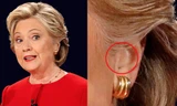 Thiết bị lạ màu da bà Hillary đeo bên tai. Ảnh: Reuters