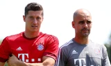 Lewandowski (trái) đang thi đấu rất thành công dưới sự dẫn dắt của Pep. Ảnh: Reuters
