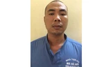 Hùng tại cơ quan công an.