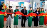 Thứ trưởng Bộ VHTT&DL Vương Duy Biên cùng các thành viên ban tổ chức cắt băng khai mạc triển lãm. Ảnh: Thanh Trần