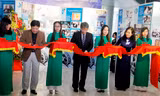 Thứ trưởng Bộ VHTT&DL Vương Duy Biên cùng các thành viên ban tổ chức cắt băng khai mạc triển lãm. Ảnh: Thanh Trần