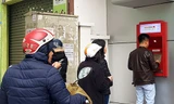 Sáng 11/2, nhiều người dân xếp hàng rút tiền trước các trụ ATM dịp cận Tết Nguyên đán 2018. Ảnh: HT