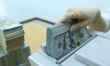 Tỷ giá trung tâm lập đỉnh mới, USD ngân hàng lên sát 23.400 đồng