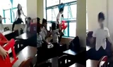 Nữ sinh Trà Vinh đánh nhau, khiến một nữ sinh bị u não, điếc 1 tai.(Ảnh cắt từ clip) 