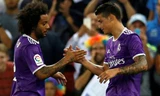 Marcelo (trái) cùng James góp công làm nên chiến thắng cho Real. Ảnh: Reuters