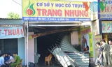 Hiện trường vụ cháy, cánh cửa sắt bị phá để dập lửa