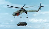 CH-54 là loại trực thăng vận tải quân sự quái dị do tập đoàn Sikorsky phát triển cho quân đội Mỹ. Trực thăng nay được ví von là một cần cẩu di động. Nó có thể nhấc bổng cả một chiếc xe tăng hạng nhẹ hay cẩu cùng lúc 2 trực thăng vận tải UH-1. Theo Militar
