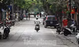 Phố vắng như Tết ngày đầu Hà Nội thực hiện đóng cửa quán xá. Ảnh: HOÀNG MẠNH THẮNG