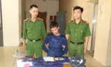 Người đàn ông thủ súng đạn tại nơi tàng trữ gần 7.000 viên hồng phiến