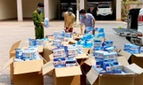 50.000 chiếc khẩu trang y tế bị lực lượng chức năng phát hiện thu giữ. Ảnh: CAHT