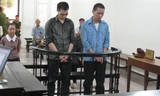 Hai bị cáo trong phiên xử ngày 30/9. Ảnh: BT
