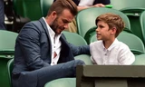 Beckham và con trai Romeo. Ảnh: Reuters
