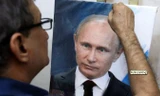 Chân dung Tổng thống Nga Putin. Ảnh: AFP.