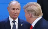 Tổng thống Nga Vladimir Putin (trái) và Tổng thống Mỹ Donald Trump. (Ảnh: CNN)