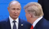 Tổng thống Nga Vladimir Putin (trái) và Tổng thống Mỹ Donald Trump. (Ảnh: CNN)