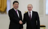 Tổng thống Nga Vladimir Putin và Chủ tịch Trung Quốc Tập Cận Bình tại cuộc gặp ngày 5/6 ở Mátxcơva. (Ảnh: Xinhua)