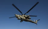 Trực thăng tấn công Mi-18N của không quân Nga. Ảnh: Tass