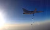 Máy bay ném bom tầm xa Tu-22M3 oanh tạc mục tiêu khủng bố ở Syria. Ảnh: Tass