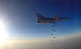 Máy bay ném bom tầm xa Tu-22M3 oanh tạc mục tiêu khủng bố ở Syria. Ảnh: Tass
