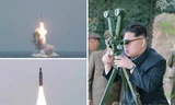 [ẢNH] Ông Kim Jong-un theo dõi phóng tên lửa từ tàu ngầm