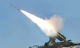  Một vụ phóng thử tên lửa đất đối không của Triều Tiên (Ảnh Reuters)