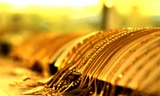 Giá vàng có xu hướng giảm nhẹ, USD ổn định
